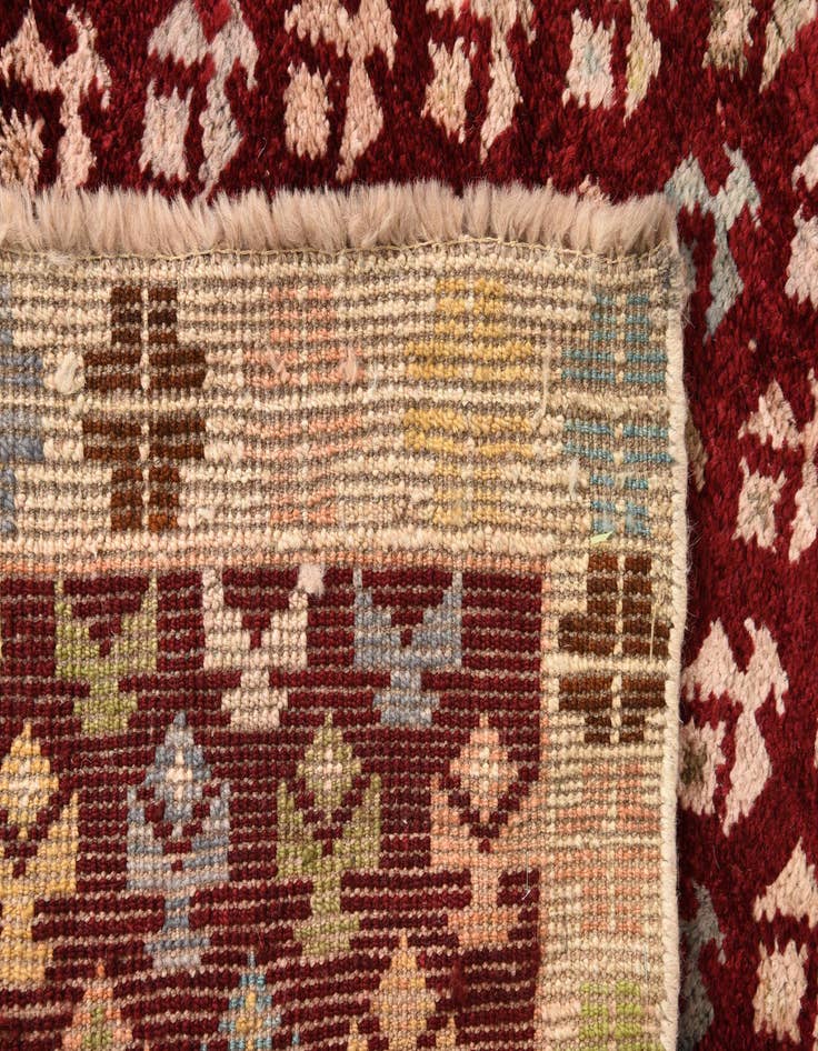 Detail image of  4' 2 x 6' 2  Hand Knotted Balouch Wool Rug