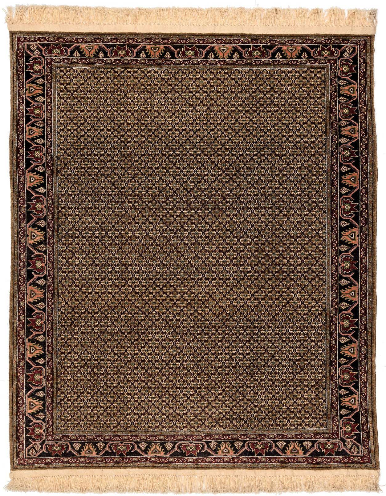 A 7x10 rectangular Bidjar rug in traditional Oriental style, featuring a dense pattern of small motifs in reds and black with a detailed border and cream fringes.