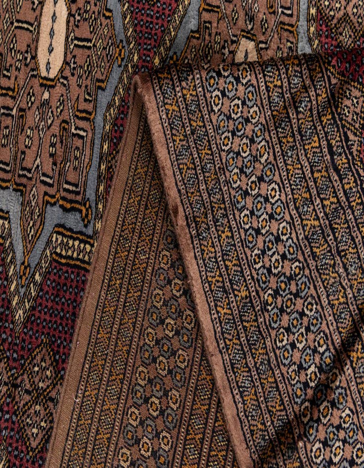 Detail image of  6' x 9' 11  Hand Knotted Bokhara Oriental Wool Rug