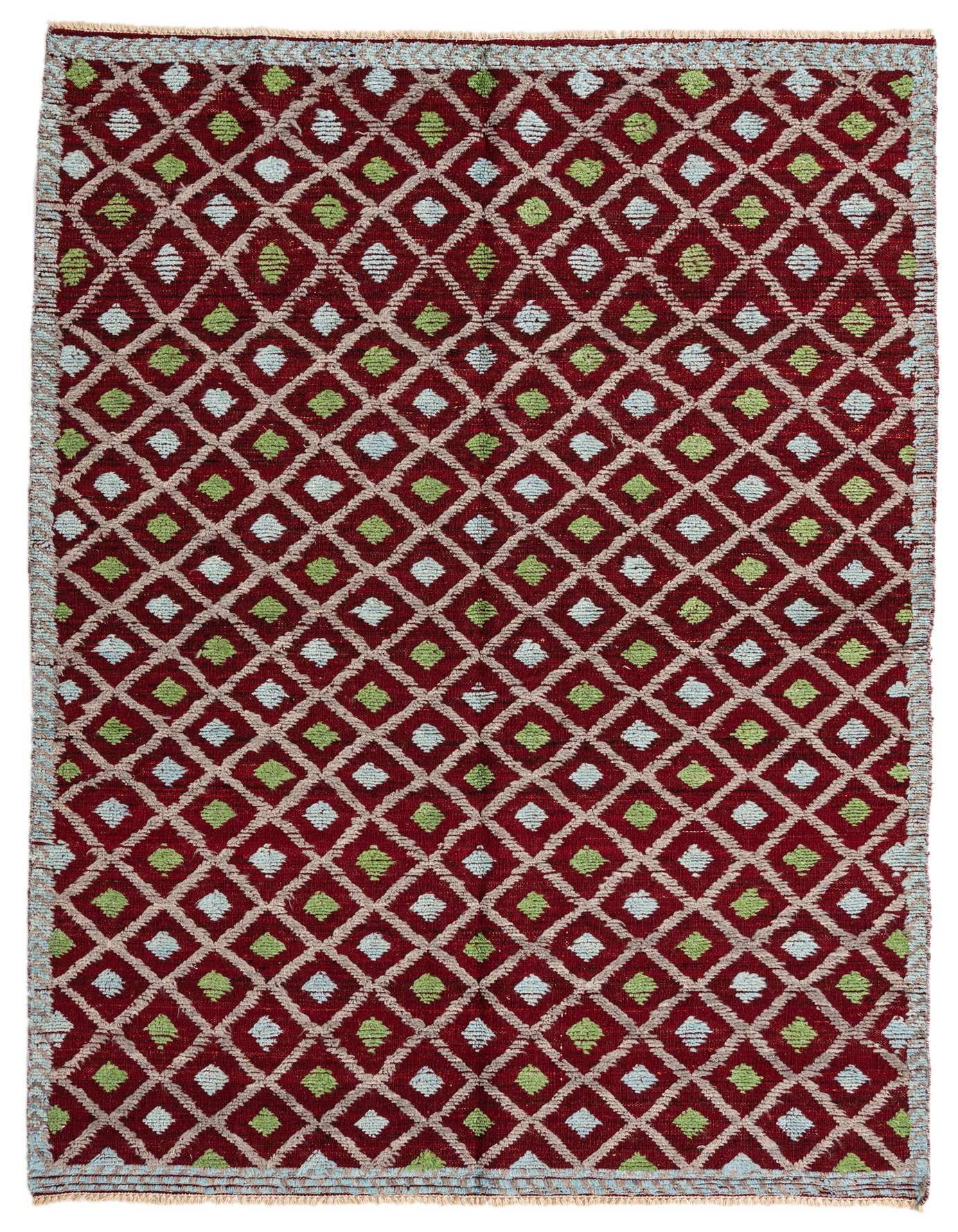A 5x8 rectangular Darya rug with a deep red background and a modern geometric pattern of light blue and green diamonds.