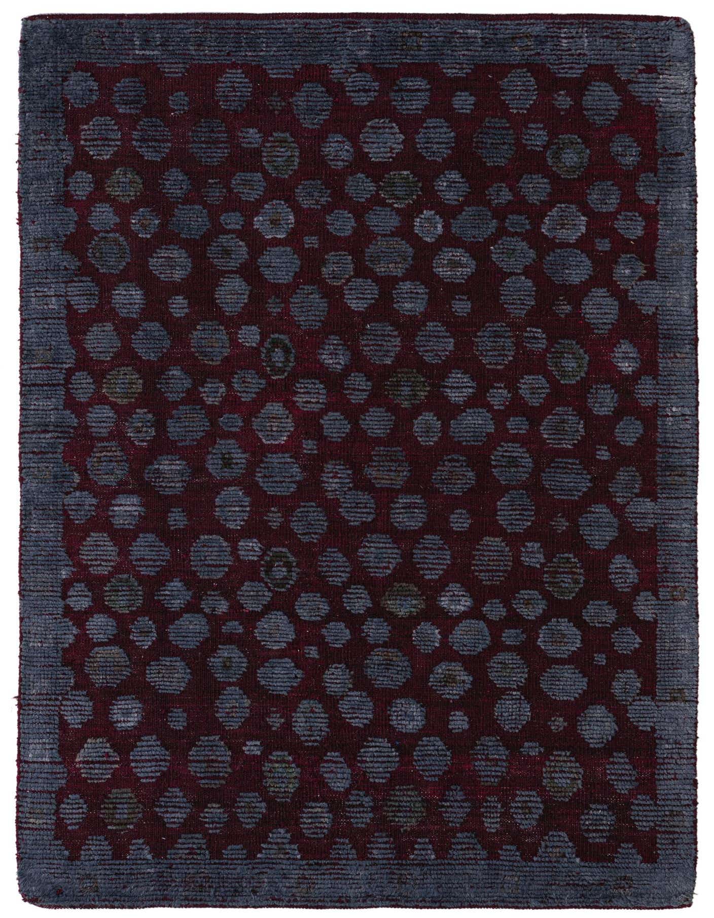 A 4x6 rectangular Darya rug with a deep red field and an abstract pattern of varying blue-grey circles, bordered by a solid blue-grey band.