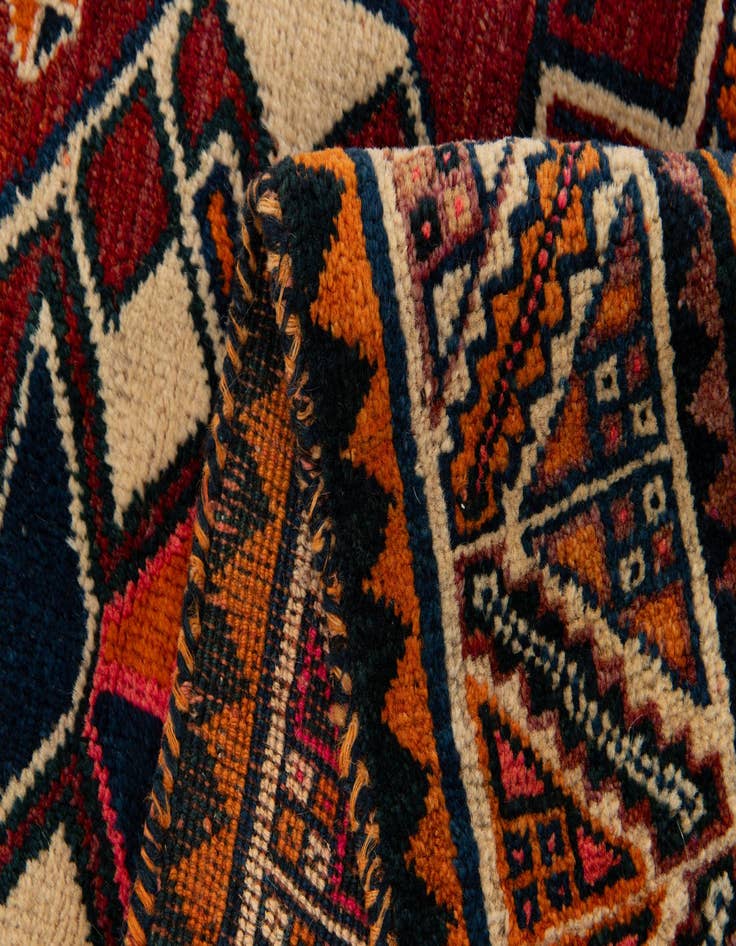 Detail image of  4' 2 x 5' 9  Hand Knotted Heriz Wool Rug