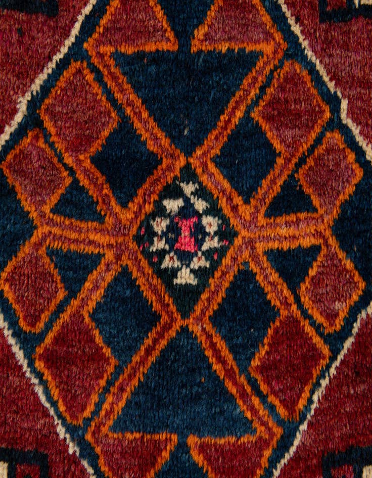 Detail image of  4' 2 x 5' 9  Hand Knotted Heriz Wool Rug