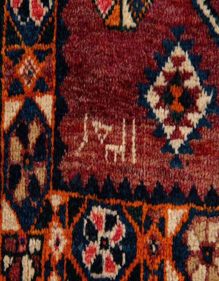 Detail image of  4' 2 x 5' 9  Hand Knotted Heriz Wool Rug