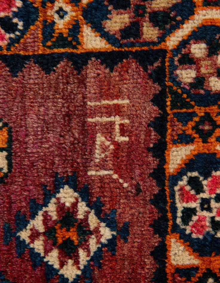 Detail image of  4' 2 x 5' 9  Hand Knotted Heriz Wool Rug