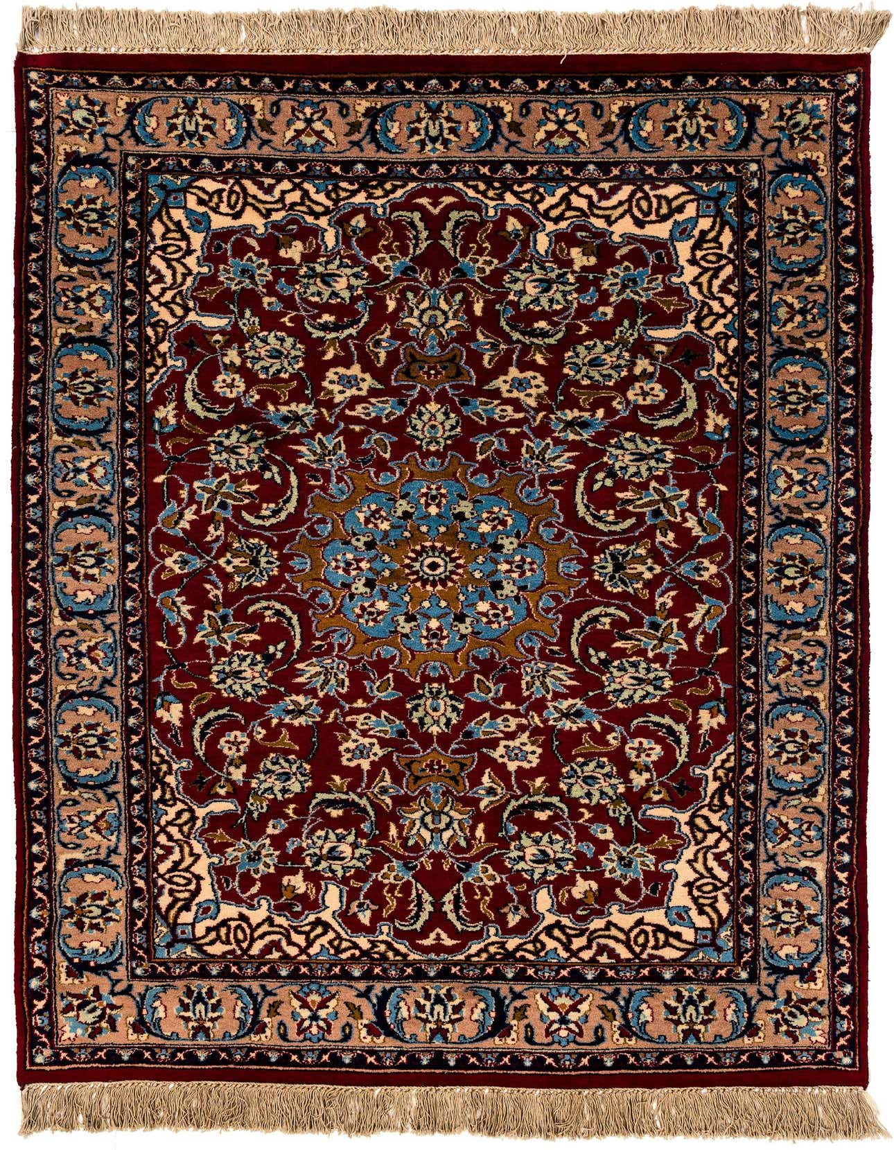 A 4x6 rectangular red wool rug with an intricate blue, beige, and brown traditional medallion pattern and fringe.