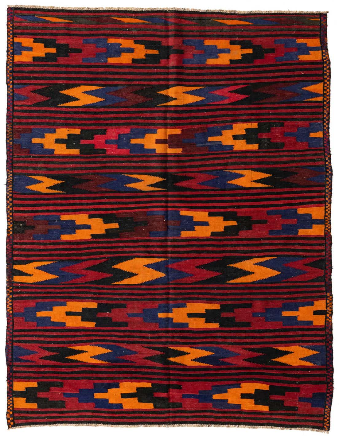 A 6x9 rectangular Kilim Fars rug with a tribal pattern in reds, oranges, blues, and black, featuring horizontal stripes and geometric motifs.