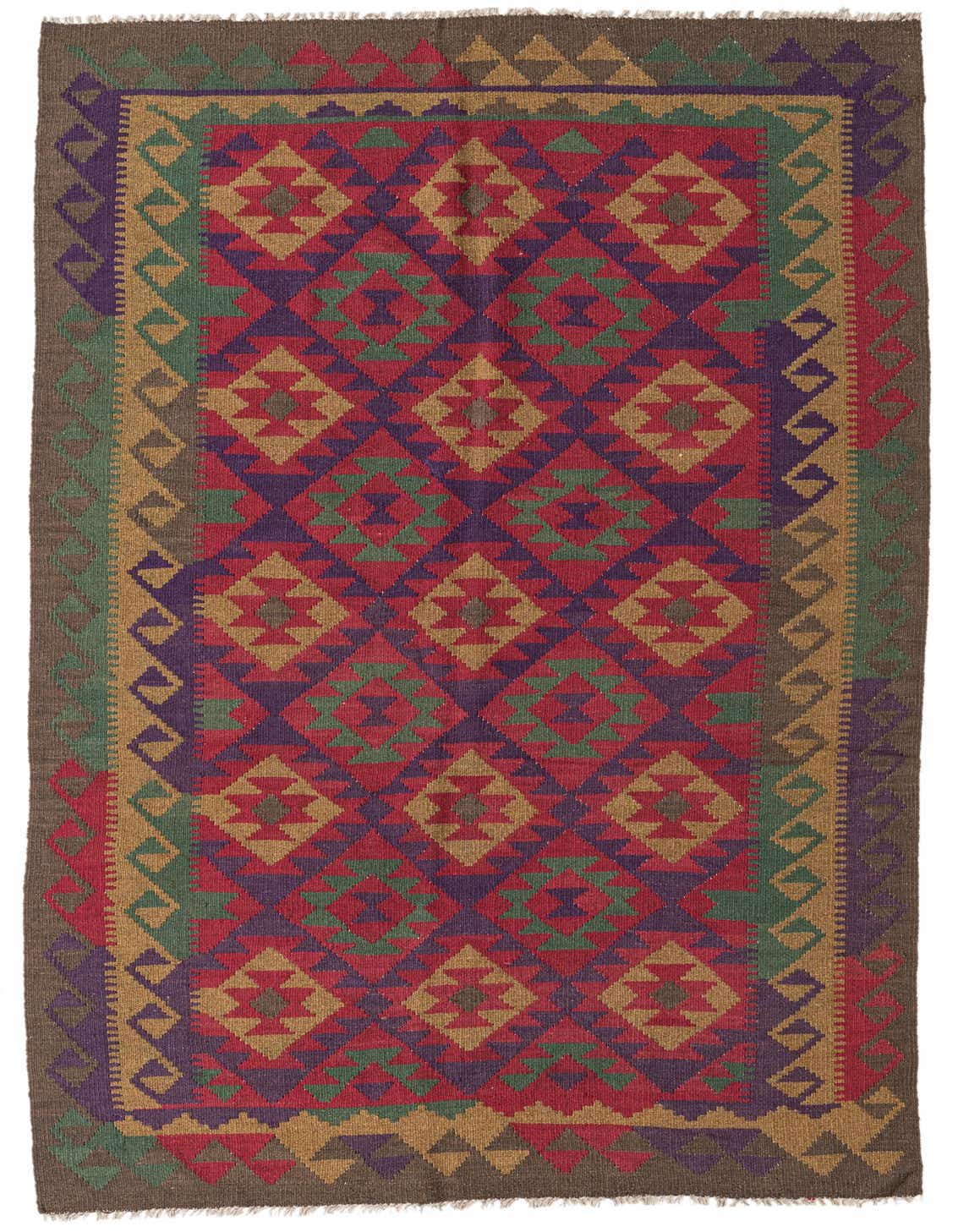 A 5x8 rectangular Kilim Maymana rug featuring a vibrant Southwestern pattern in reds, purples, greens, and gold, with a flatweave texture.