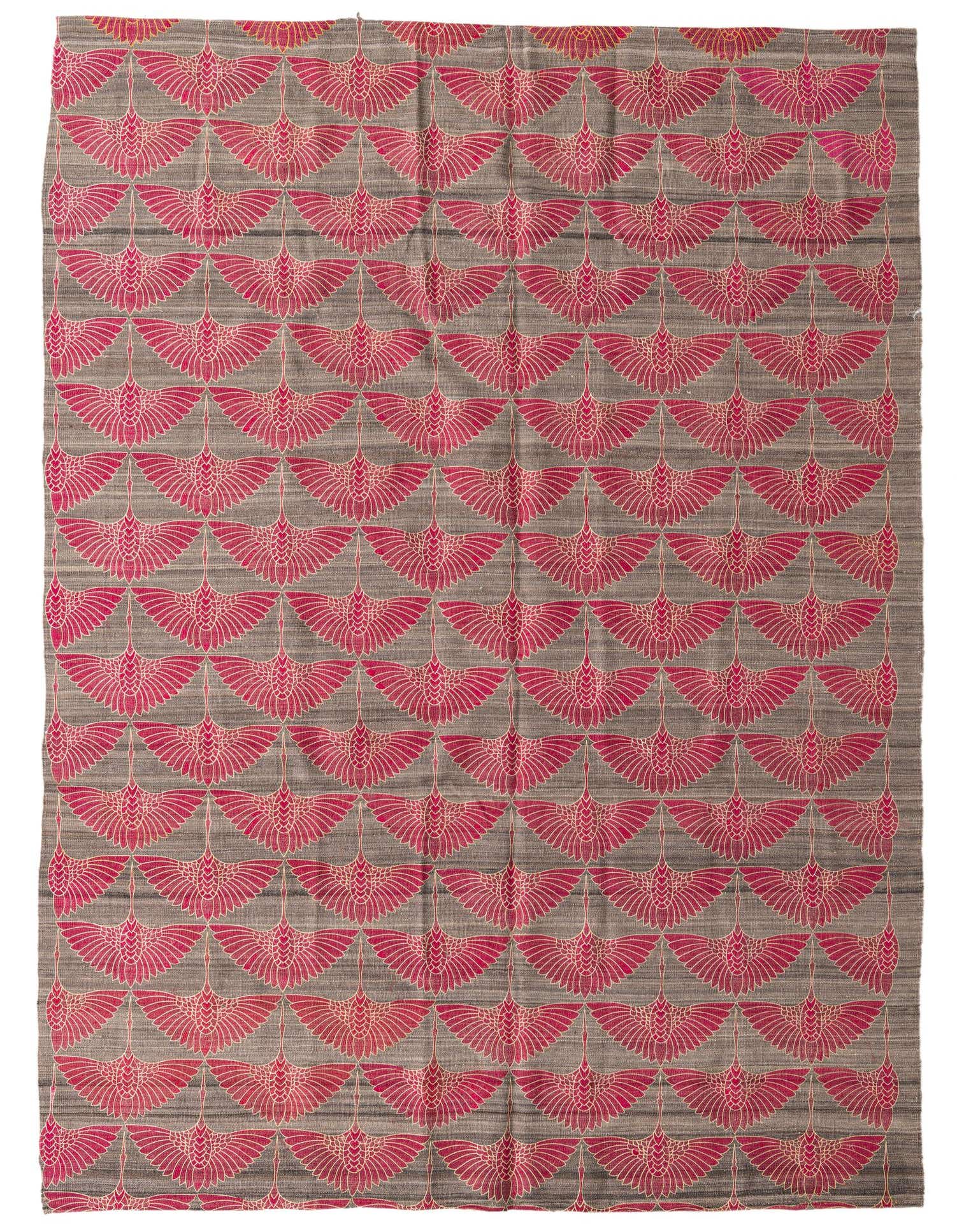 A 7x10 rectangular flatweave wool rug with a repeating pattern of stylized red cranes on a gray background.