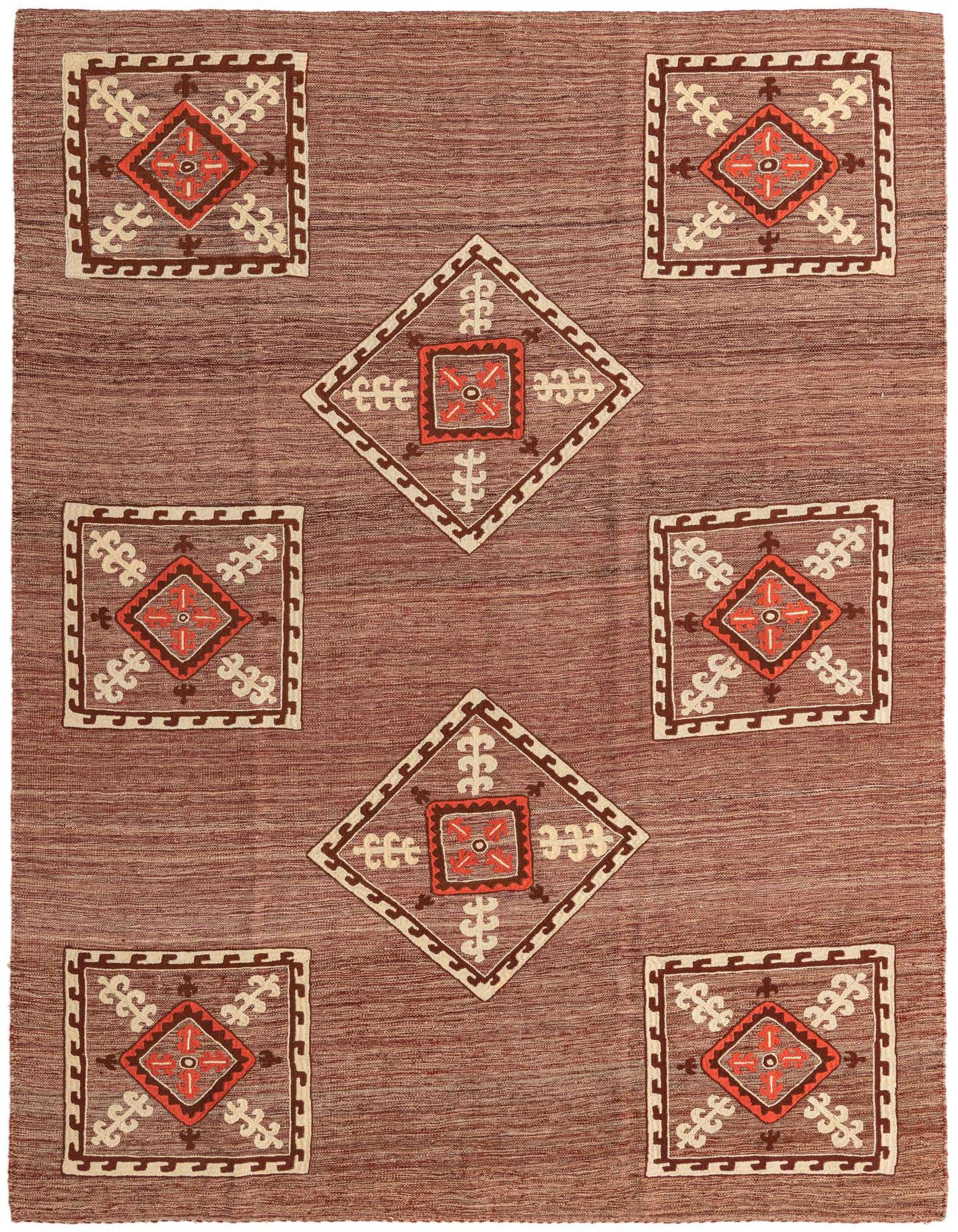 A 6x9 rectangular red flatweave rug with a tribal pattern of large diamond and square motifs in cream, brown, and orange.