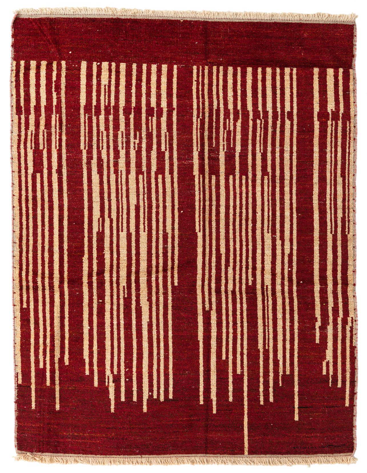 A 6x9 rectangular red wool shag rug with an abstract tribal pattern of thin, irregular beige vertical lines.