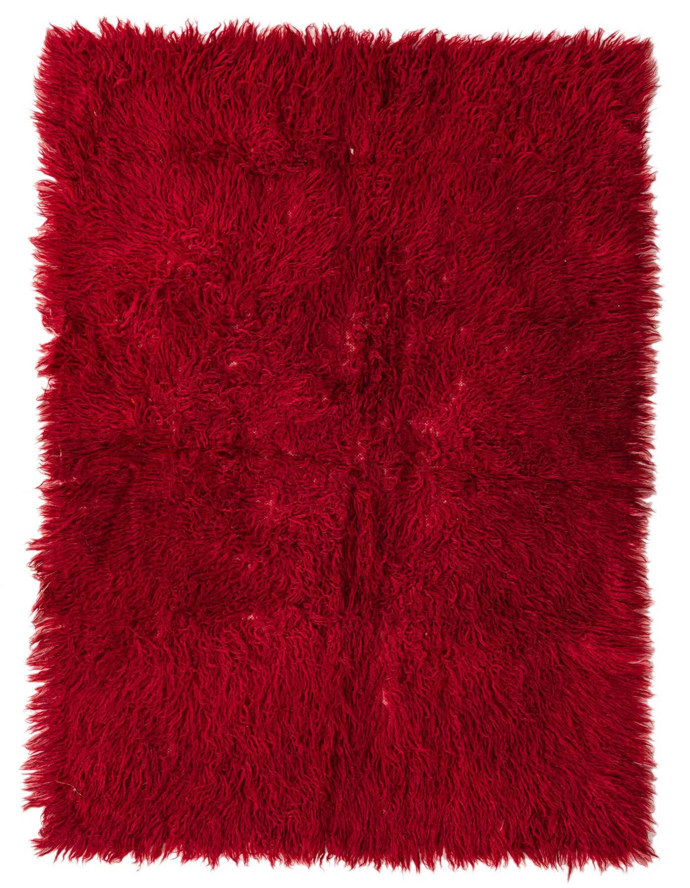A vibrant 4x6 rectangular red shag rug with a thick, plush pile, perfect for a cozy living room.