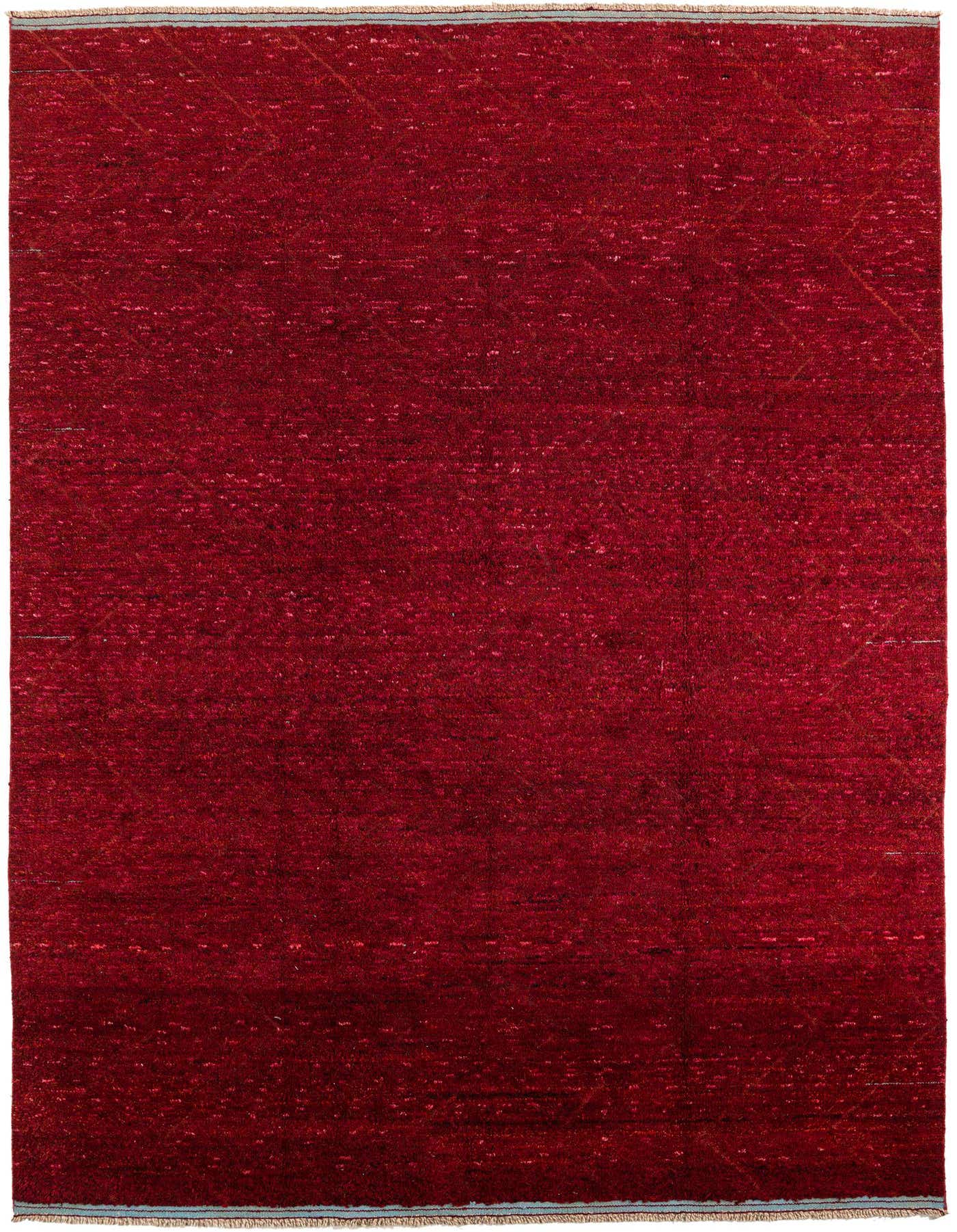 A 9x12 rectangular red shag rug with subtle tribal patterns, suitable for a living room or bedroom.