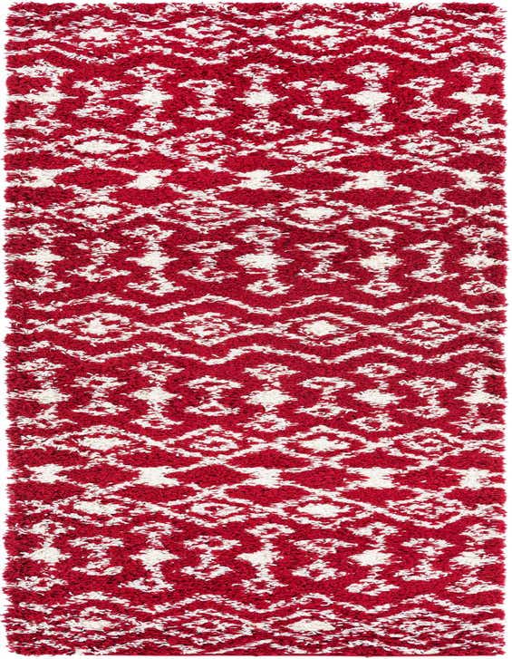 A 10 ft runner rug featuring a plush red shag pile with an abstract white tribal pattern, ideal for a hallway.