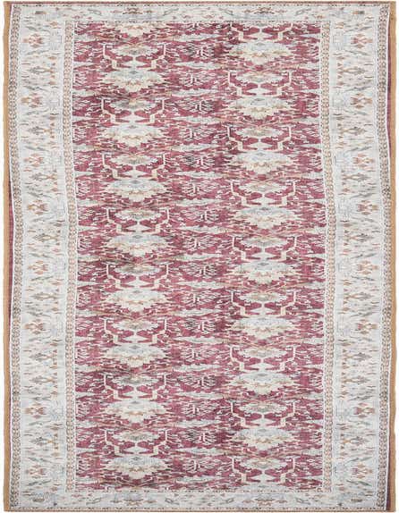 A 12 ft runner rug with a traditional medallion pattern in distressed reds, creams, and grays, ideal for a hallway.