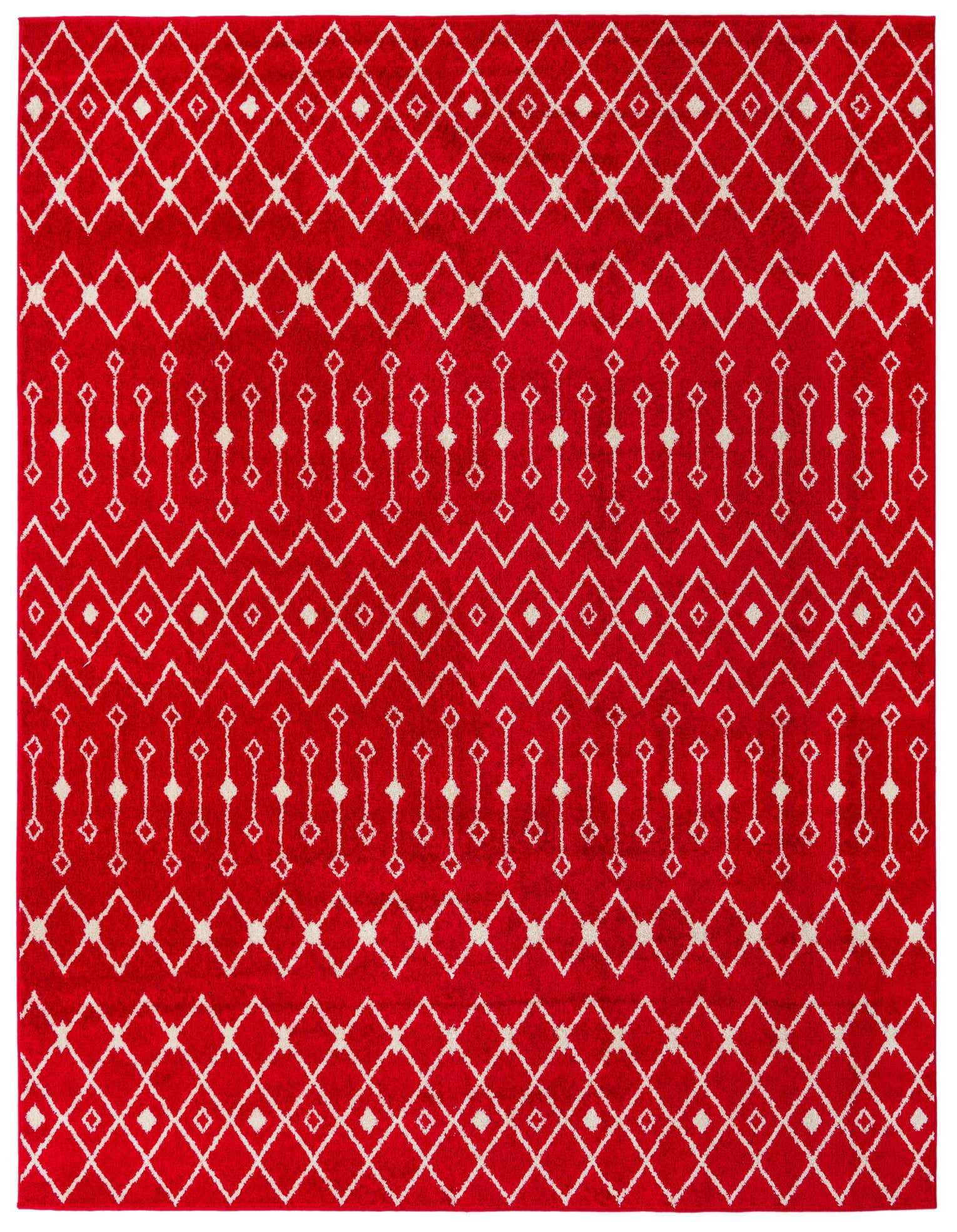 A vibrant red square area rug with a white bohemian trellis pattern, featuring diamond and striped motifs.