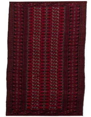 A long, thin 19 ft runner rug in deep red with black and white traditional tribal patterns, ideal for hallways.