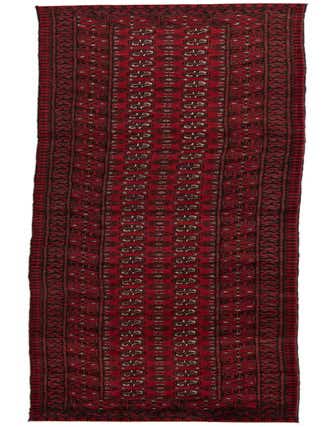 A long, thin 19 ft red runner rug with a traditional tribal pattern in dark red and black, suitable for hallways.