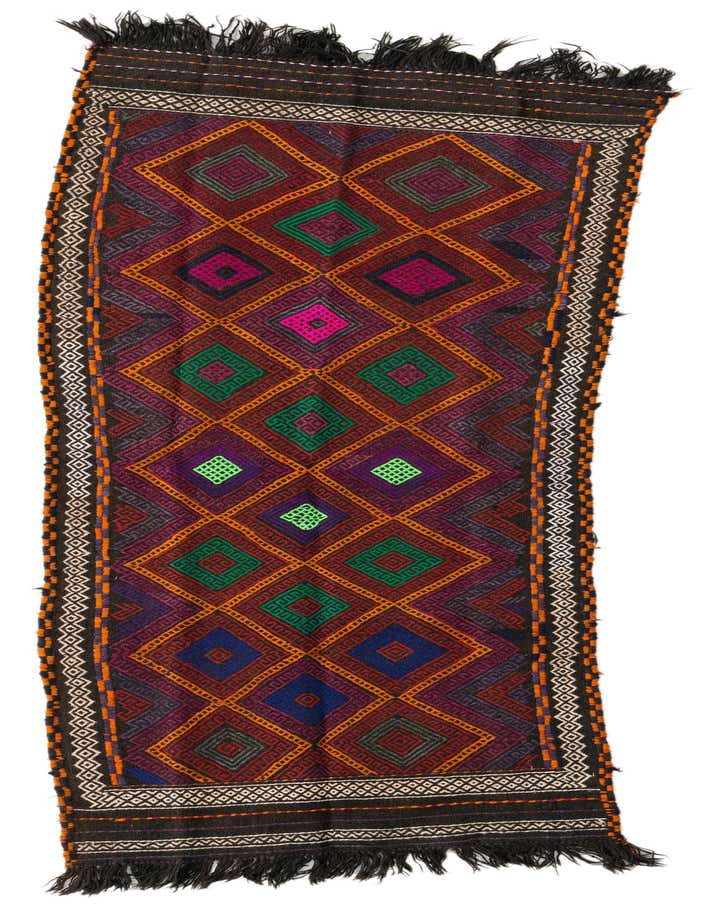 A vibrant 7 ft Kilim Fars runner rug featuring a tribal geometric pattern in reds, oranges, greens, and purples with black fringe.
