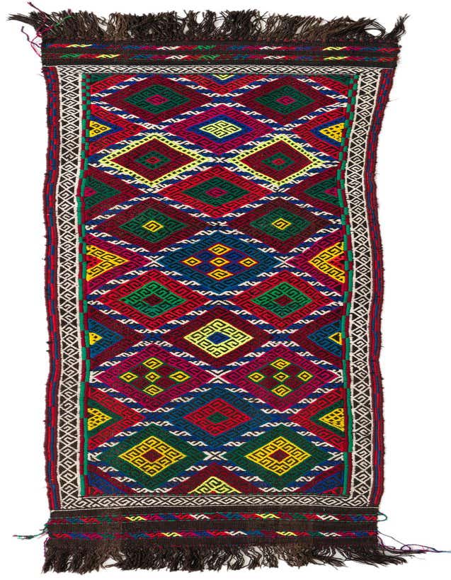 A vibrant 7 ft Kilim Fars runner rug with a tribal geometric pattern in reds, blues, greens, and yellows, ideal for a hallway.