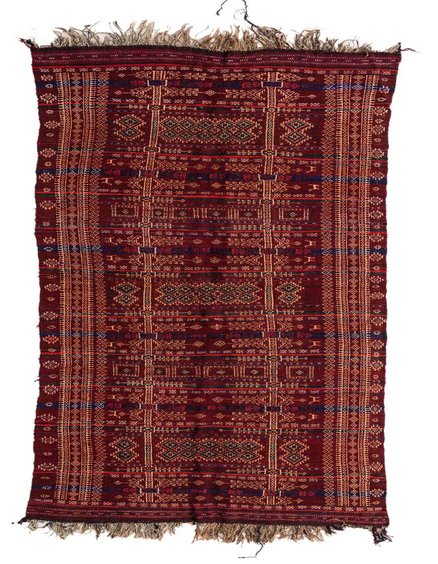 A 12 ft red Persian tribal runner rug with intricate geometric patterns and fringe, suitable for a hallway.