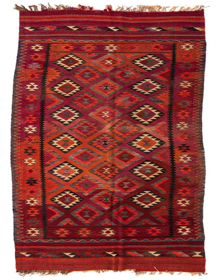A long, flatweave Kilim Fars runner rug in rich reds, oranges, and black with a tribal geometric diamond pattern, suitable for a hallway.