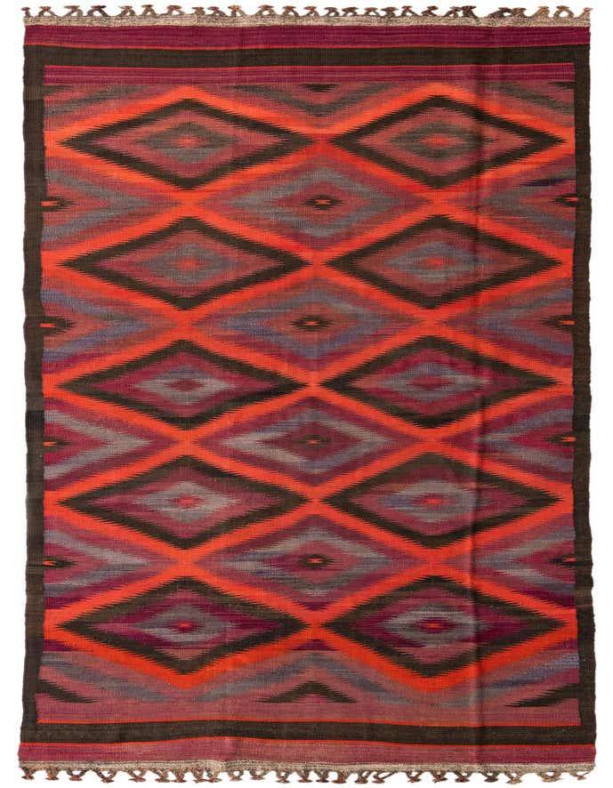 A 15 ft runner rug, the Kilim Fars features a vibrant geometric pattern of red, orange, and purple diamonds on a flatweave wool.