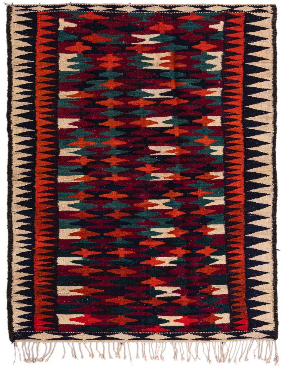 A 9 ft runner rug from the Kilim Fars collection, featuring a vibrant Persian tribal pattern in reds, oranges, greens, and dark blues.