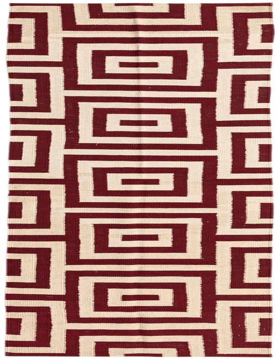 A 10 ft runner rug with a bold tribal geometric pattern in red and cream, ideal for a hallway.