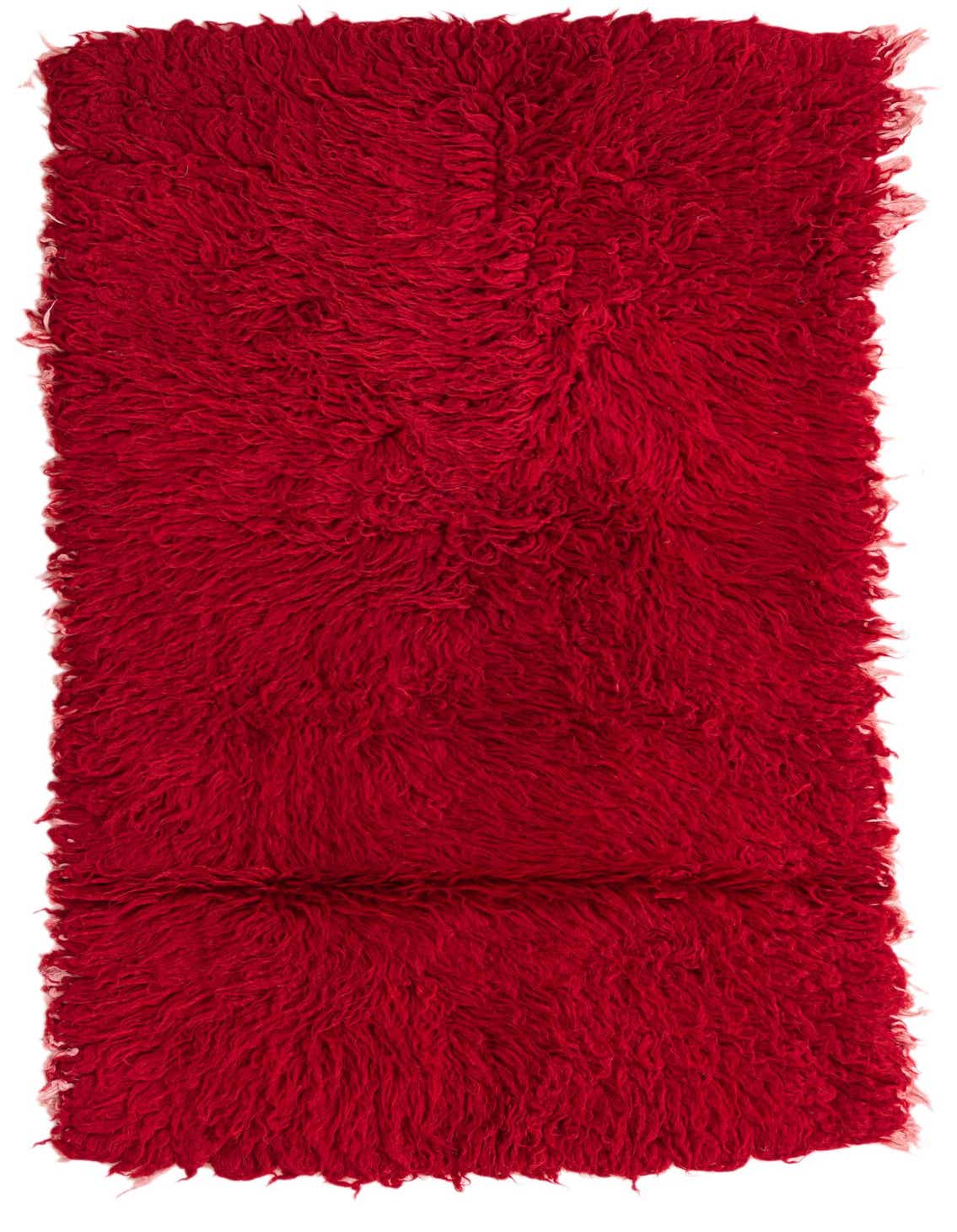 A vibrant red 5 ft runner rug with a plush shag pile, showcasing its handmade texture.