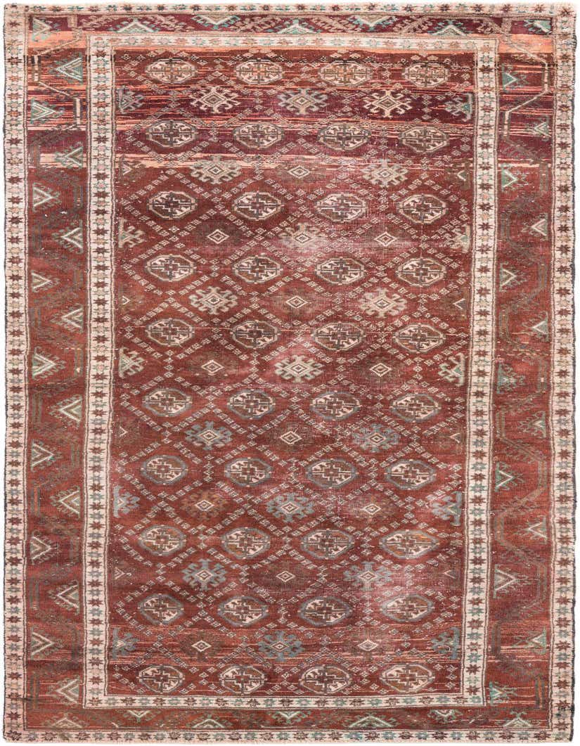 A 10 ft runner rug in shades of red with a distressed Persian-style pattern and decorative borders, ideal for a hallway.