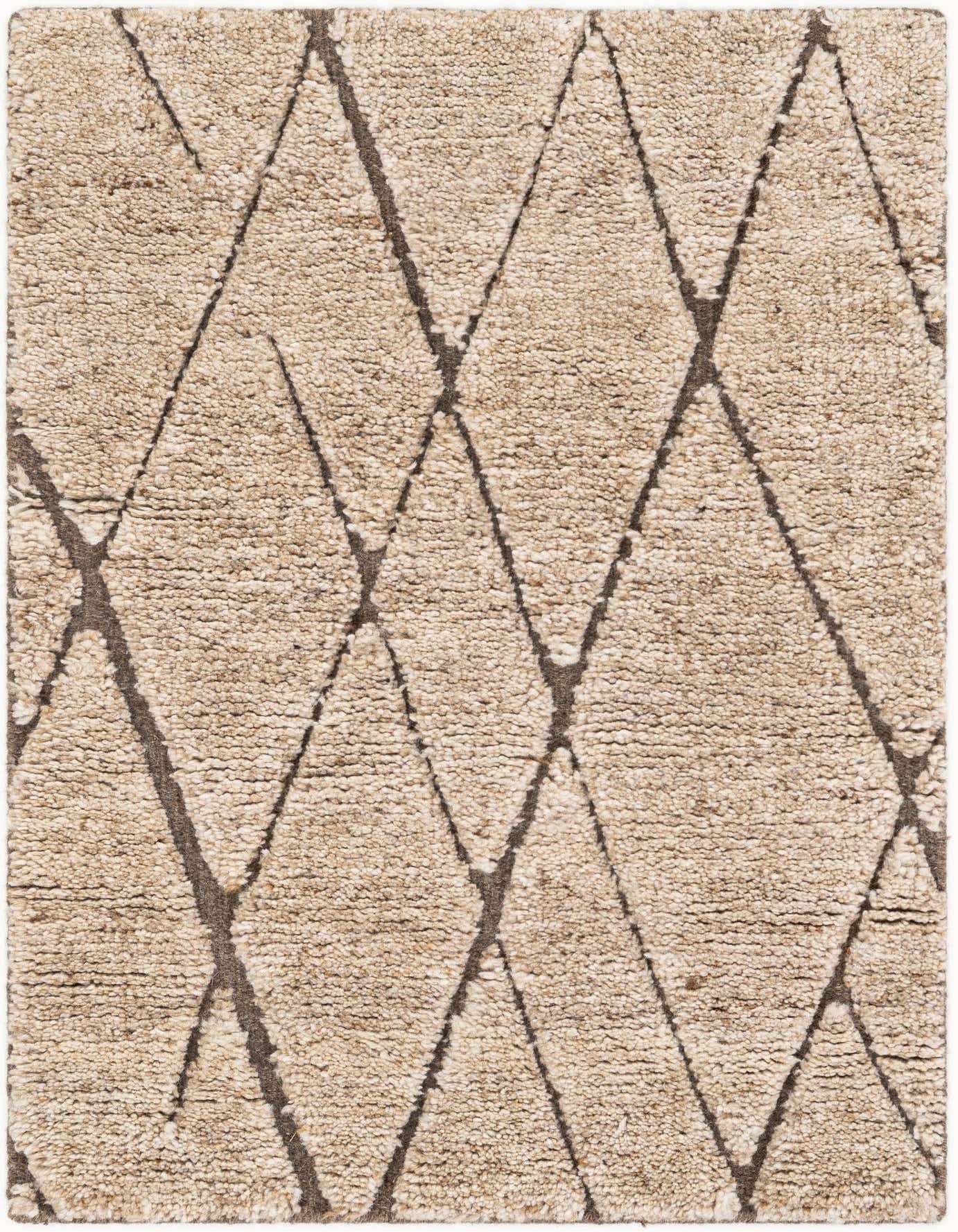 A 2x3 rectangular Atlas Moroccan Wool rug featuring a textured tan background with a bold brown tribal diamond pattern.