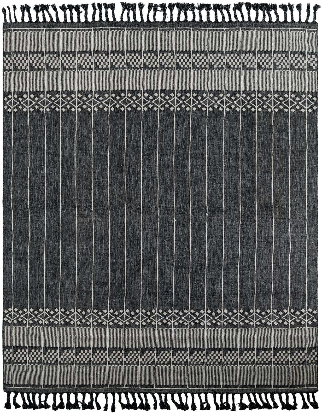 A 10x14 rectangular Eco Bohemian rug in black with white stripes and geometric patterns, featuring tassels.