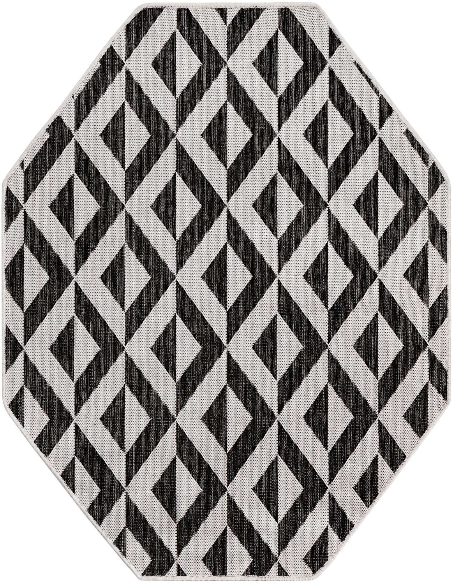 An octagon-shaped black and white rug with a modern geometric trellis pattern, suitable for indoor or outdoor use.