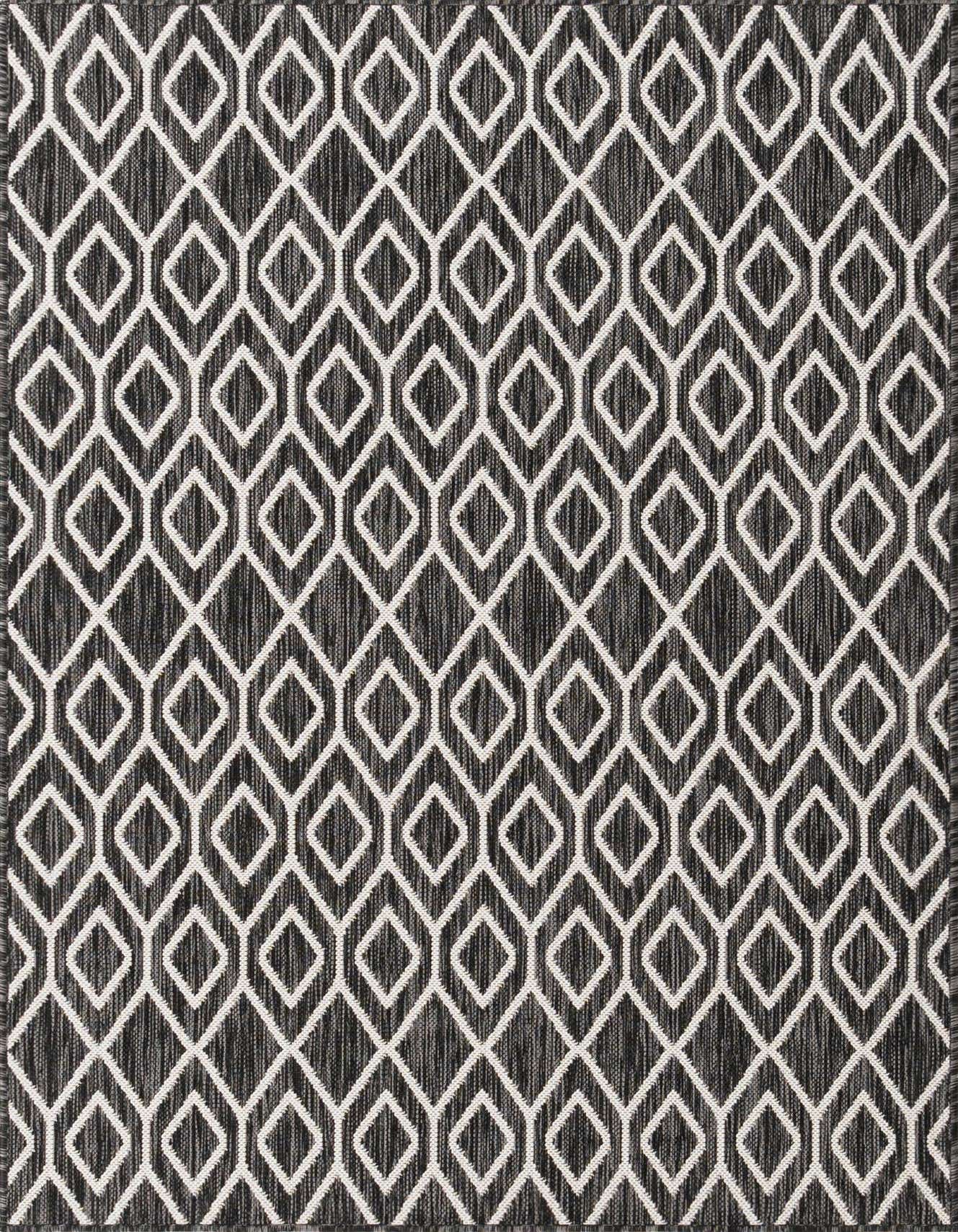 A 4x6 rectangular black and white geometric trellis rug with a textured flatweave, suitable for indoor or outdoor use.