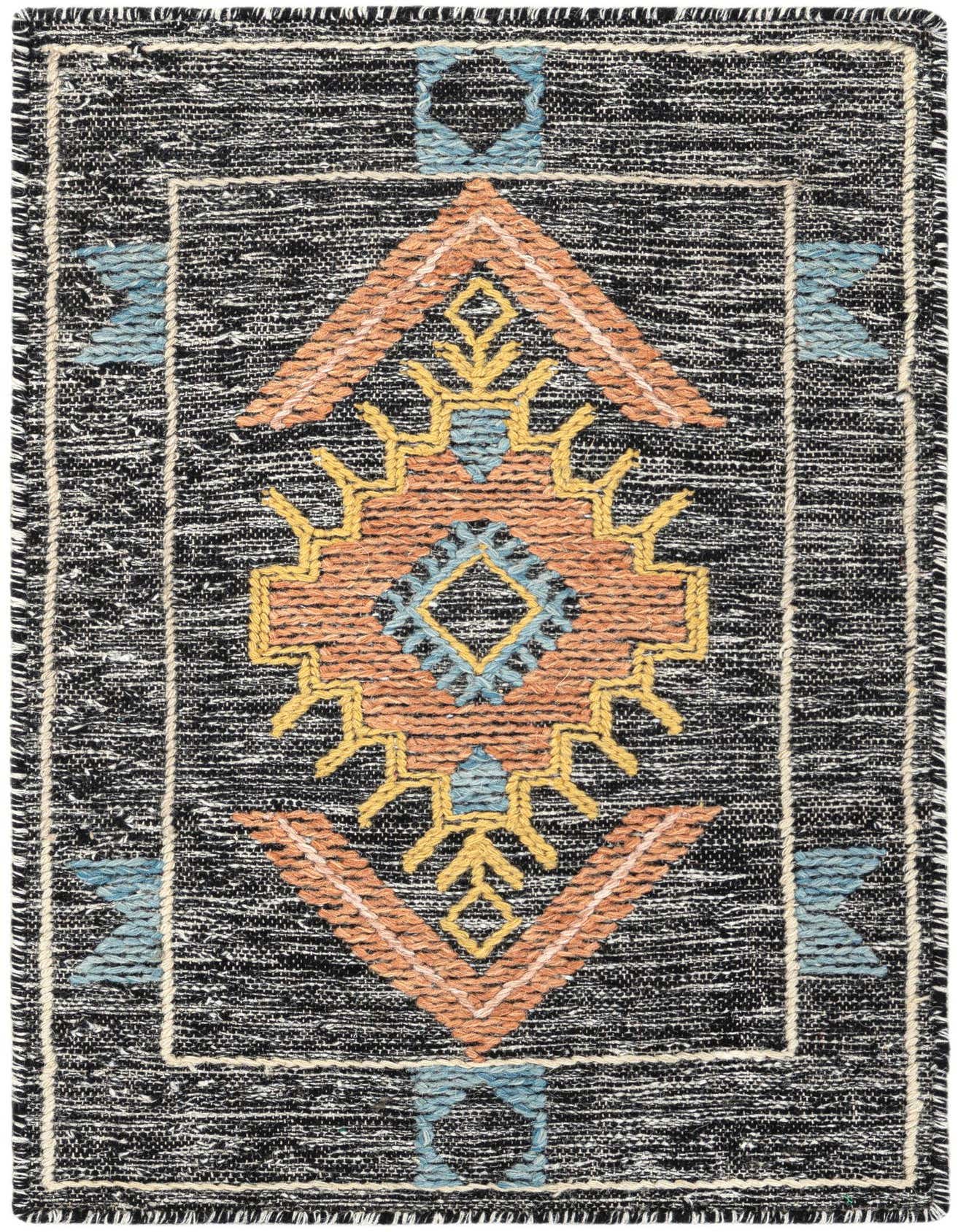 A 2x3 rectangular black and white wool rug with a central orange, yellow, and blue tribal medallion pattern.