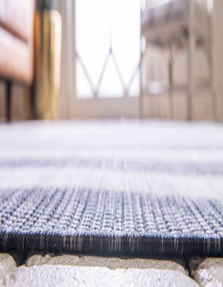 Detail image of  7' 10 x 11'  Washable Ribbon Indoor / Outdoor Rug