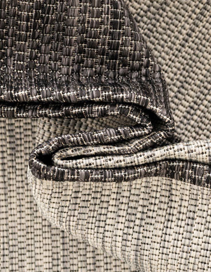 Detail image of  7' 10 x 11'  Washable Ribbon Indoor / Outdoor Rug