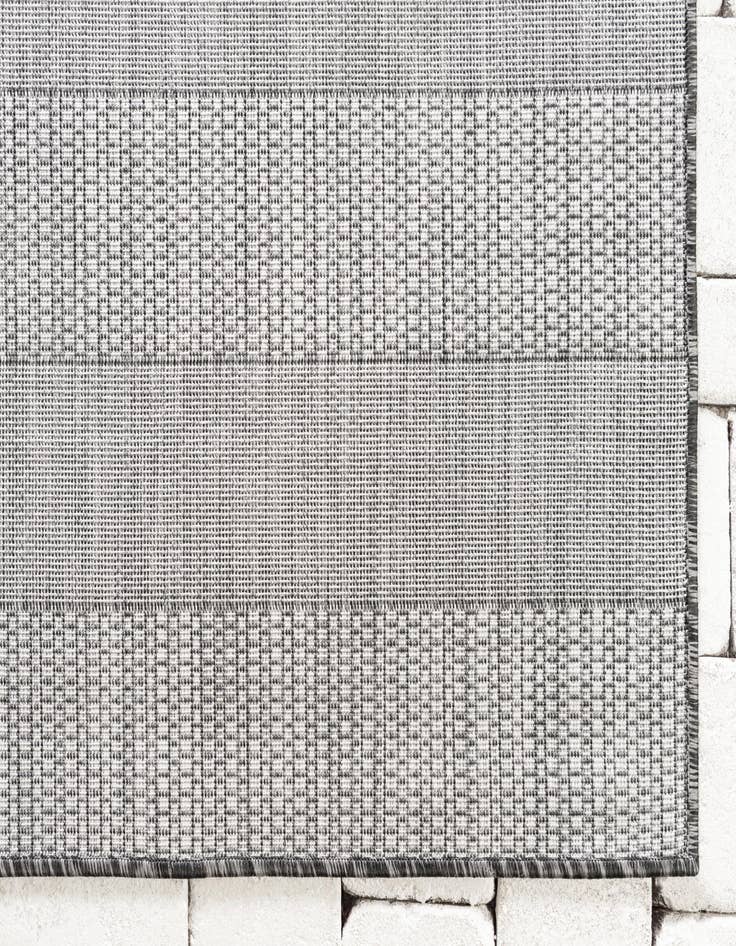 Detail image of  7' 10 x 11'  Washable Ribbon Indoor / Outdoor Rug