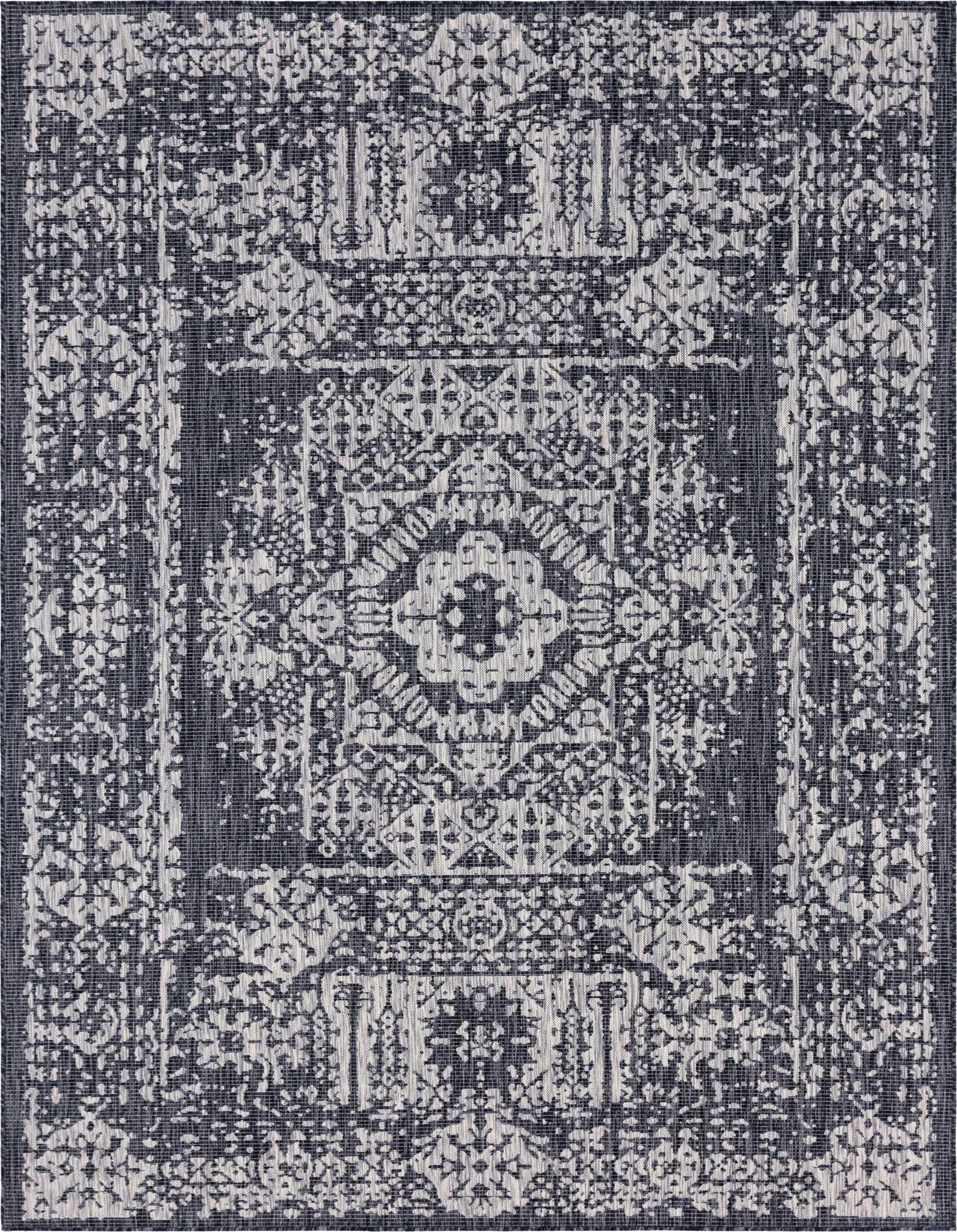 An 8x11 rectangular indoor/outdoor rug featuring a distressed black and gray traditional medallion pattern.