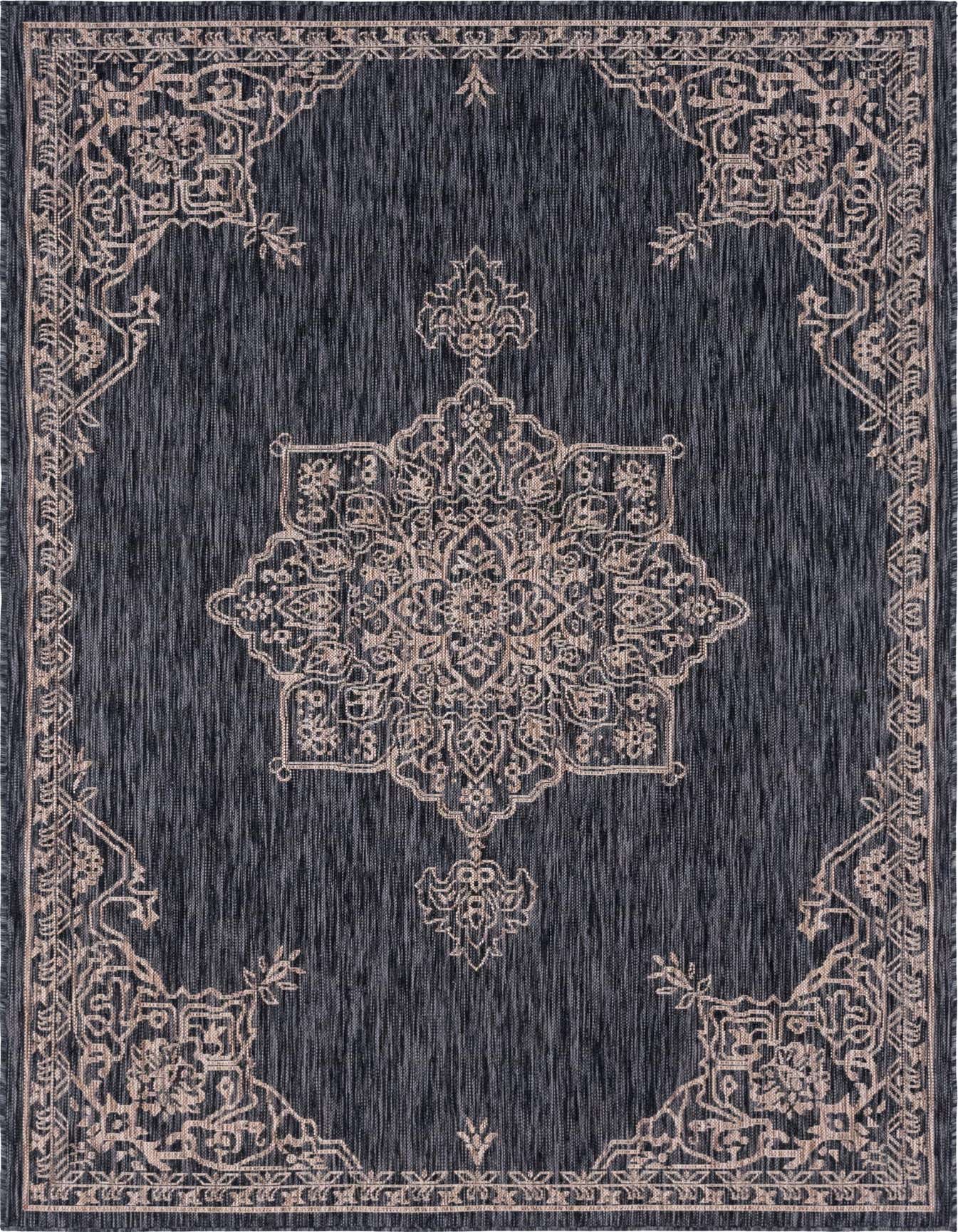 A 6x9 rectangular indoor/outdoor rug featuring a traditional medallion pattern in black and gray, ideal for a patio or living room.