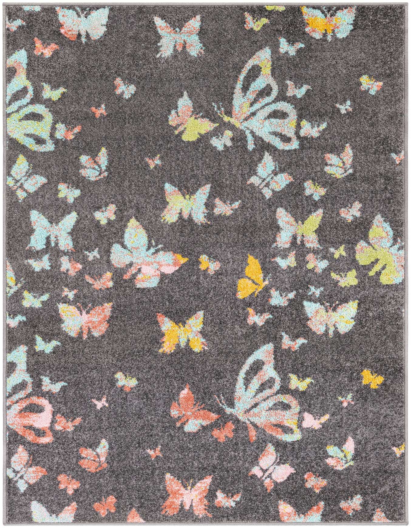 A 4x6 rectangular black rug with a playful pattern of colorful butterflies in shades of blue, pink, and yellow.