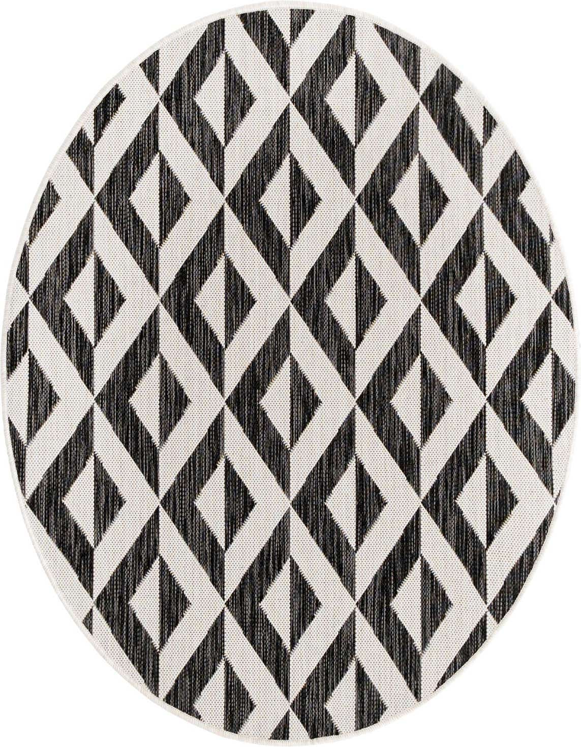 A 4' round black and white geometric trellis rug with a textured flatweave, suitable for indoor or outdoor use.