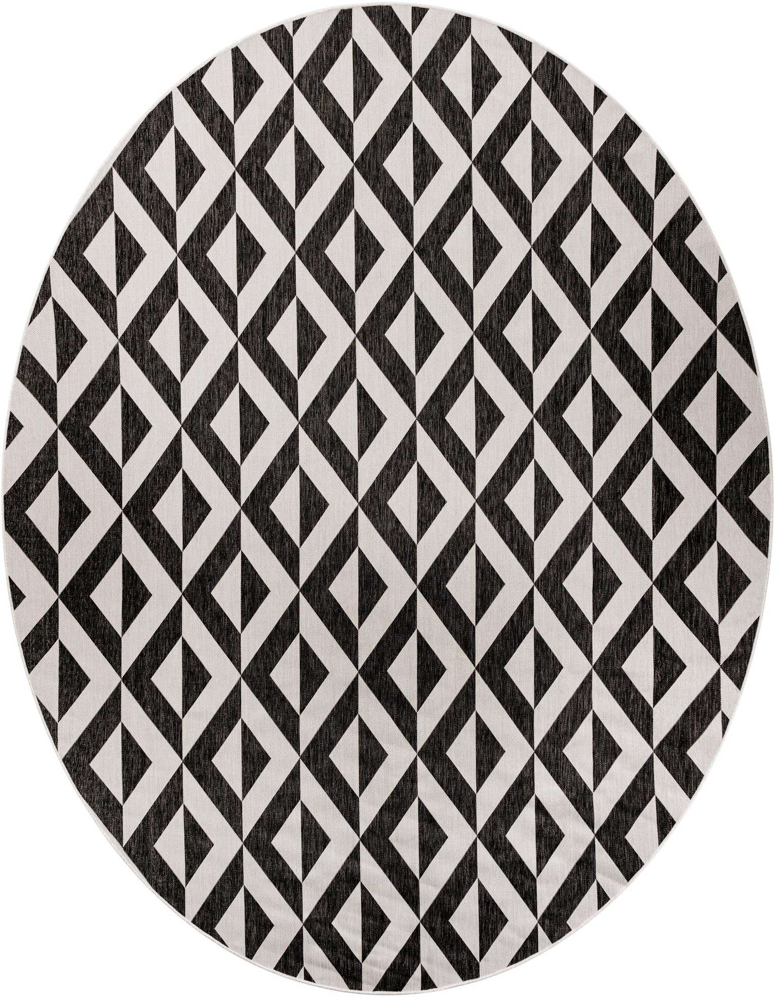 A 12-foot round black and white geometric trellis rug with a textured flatweave, suitable for indoor or outdoor use.