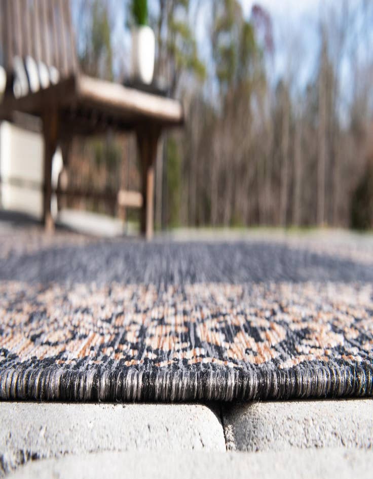 Detail image of  10' 8 x 10' 8  Washable Border Indoor / Outdoor Round Rug