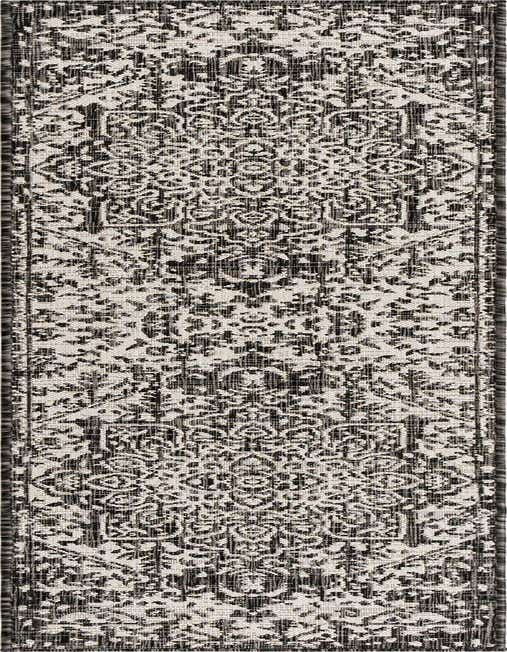 A black and white 8 ft runner rug with a traditional medallion and floral pattern, suitable for a hallway or patio.