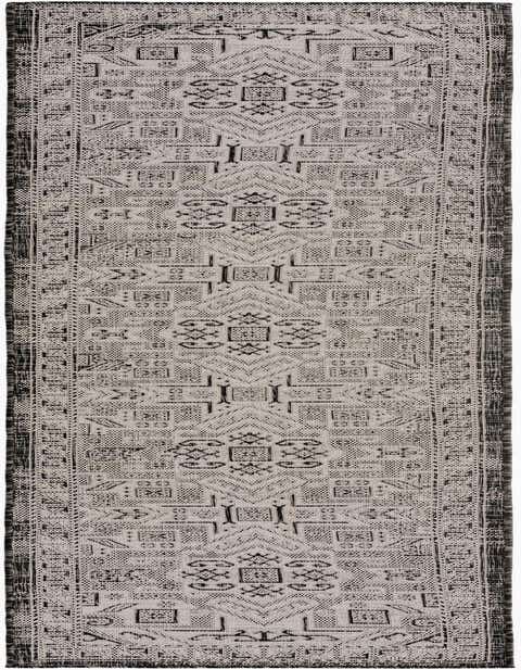A 12 ft runner rug from the Rugs.com Outdoor Aztec collection, featuring a black and gray Southwestern pattern with tribal motifs, suitable for hallways or patios.