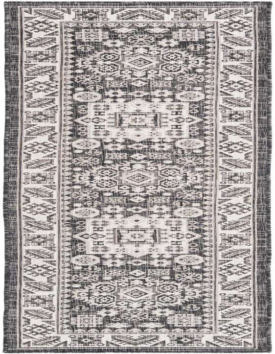 A black and white Southwestern tribal runner rug with intricate geometric patterns, perfect for a hallway or kitchen.