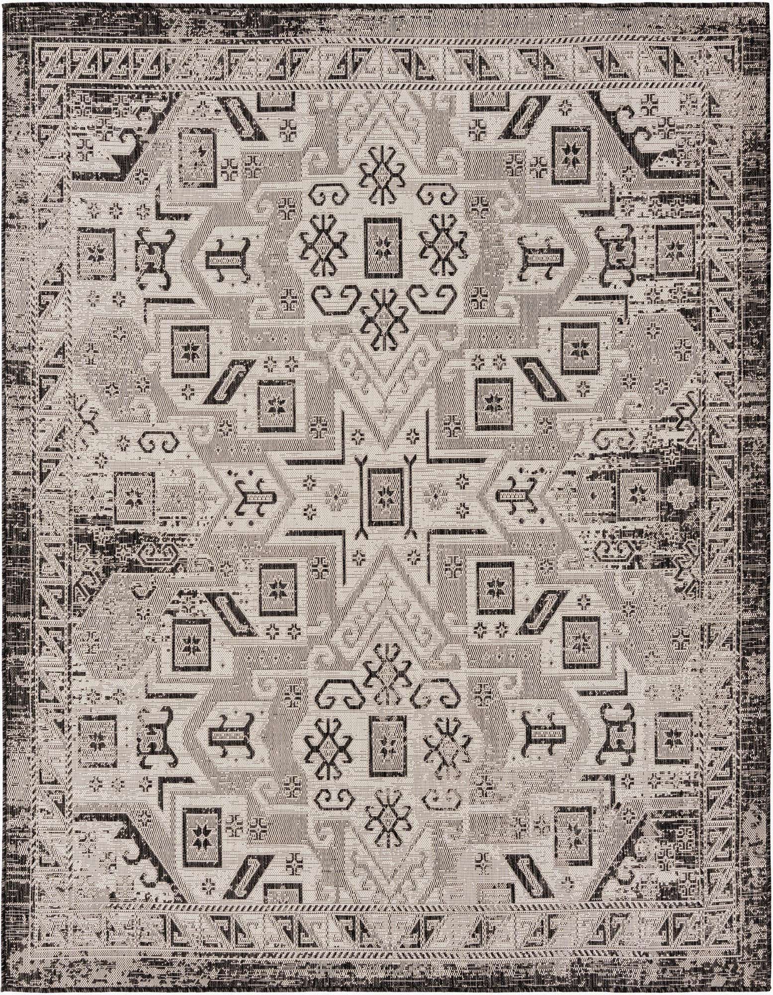 A 7'10" square black and gray Southwestern flatweave rug with a distressed tribal pattern, ideal for a patio.