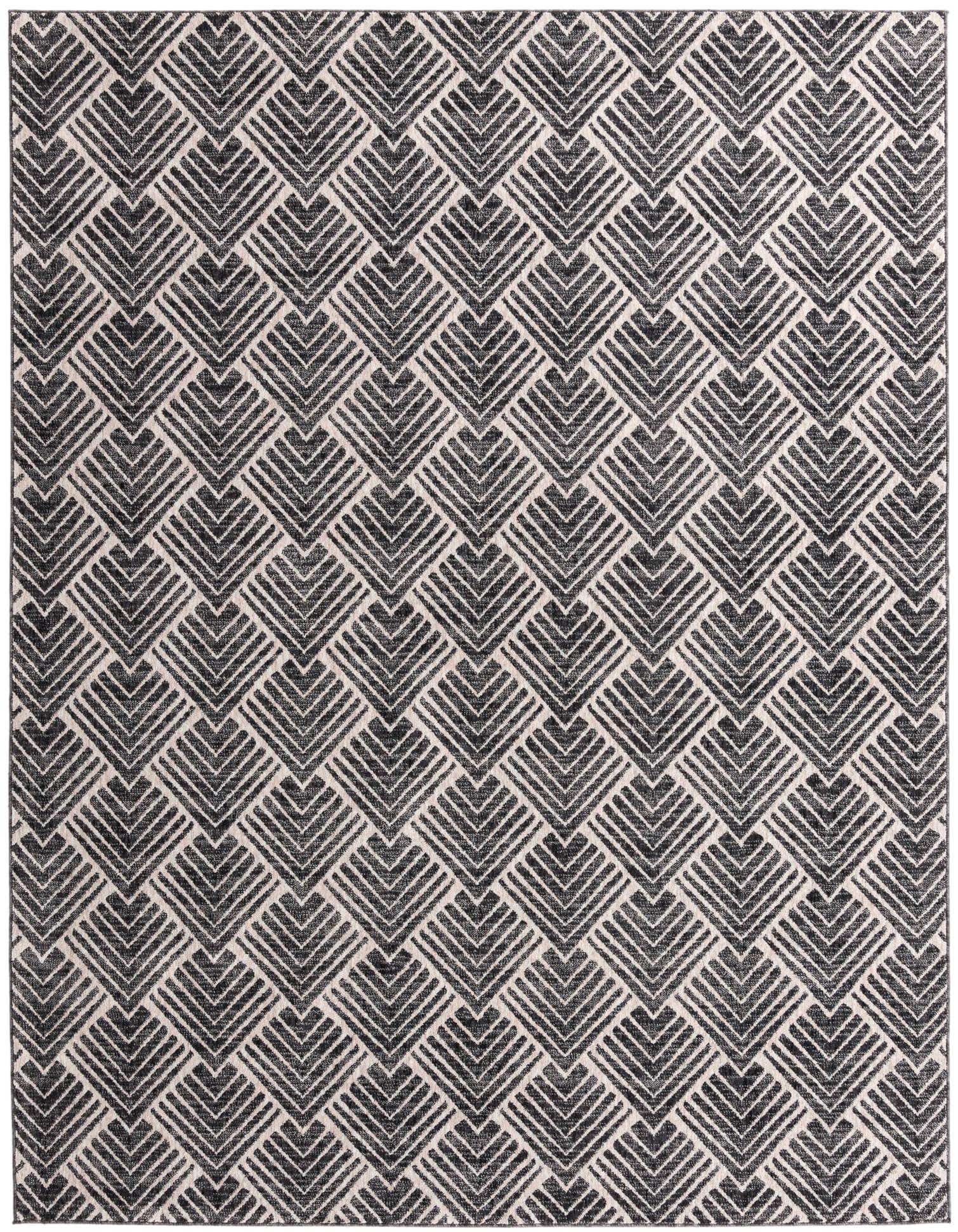 A rectangular 8x10 charcoal and ivory rug featuring a modern trellis pattern of repeating V-shapes.